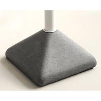 Table de salle à manger ronde contemporaine pour café et restaurant, avec base en terrazzo, poteau en acier laminé à froid et plateau en panneau de haute densité fini par pulvérisation émaillée