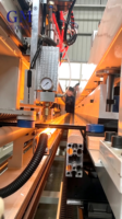 Nouvelle table de découpe de verre feuilleté entièrement automatique et semi-automatique, contrôlée par PLC, entraînée par un moteur, capacité de 100 m/min pour le verre