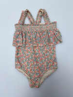 Vente en gros de bikinis européens pour enfants, maillots de bain une pièce d'été pour filles, vêtements de plage, costume de princesse UV à volants imprimé avec chapeau, 2025