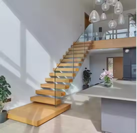 Escalier en L moderne, durable et écologique pour intérieur, avec garde-corps en fil d'acier et verre trempé, bois massif et acier inoxydable