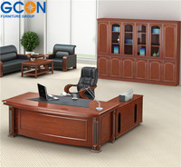 Bureau de direction moderne de luxe en bois en forme de L avec table d'appoint