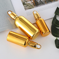 Flacon compte-gouttes en verre doré/argenté personnalisé de 5ml/10ml/15ml/20ml/30ml/50ml/60ml/100ml/120ml pour sérum et huiles essentielles avec diffuseur à bâtonnets