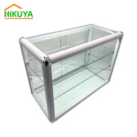 Vitrine en aluminium avec dessus de table en verre trempé et lumières LED