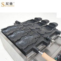 Fabricant commercial de Taiyaki et machine de casse-croûte de crème glacée gaufrier électrique en forme de poisson avec cône de gaufre de gâteau état neuf