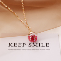 Collier YWXS tendance en alliage plaqué or avec chaîne simple et pendentif étoile fluorescente en verre pour fille