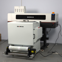 Nouvelle imprimante DTF A1 double I1600/I3200 à haute vitesse avec secoueur de poudre automatique et four pour les usines de vêtements