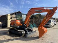 Mini-excavatrice hydraulique sur chenilles Doosan DX60 d'occasion, bien entretenue, prête à être expédiée sur les marchés mondiaux