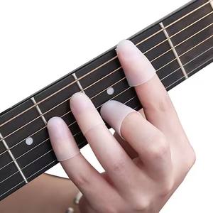 Protection pour les doigts de la main gauche pour guitare, <span class=keywords><strong>housse</strong></span> en silicone pour ukulélé, accessoires d'instruments, protège-doigts pour la pression - Product Image 3
