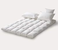 Oreiller en plumes de canard en peluche et doux à usage hôtelier Topper de lit matelassé et plié pour un sommeil semblable à un nuage