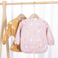 Bavoirs imperméables à manches longues Tablier en polyester PU facile à nettoyer avec fermeture à pression de poche Bavoir pour bébé