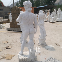 Statue d'homme nu en pierre de jardin moderne par David Factory fournie pour une application en extérieur Style de design traditionnel