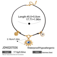 Collier Pendentif Œil Élégant avec Breloque Hamsa, Cristal Doré, Œil Bleu, Cordon Noir – Bijoux en Gros Personnalisables pour Femmes