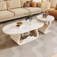 Table basse convertible moderne de luxe léger avec plateau en ardoise et structure en acier, design minimaliste pour salon