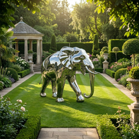 Sculpture d'éléphant en acier inoxydable, design géométrique faceté saisissant, style traditionnel et moderne, poli, décoration extérieure pour jardin, parc, place publique