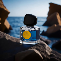 Flacon de parfum carré en verre Maroc MK 50ML avec pulvérisateur à pompe, capuchon noir effet galet, liquide bleu, origine Jiangsu