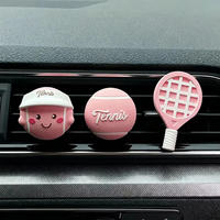 Diffuseur créatif pour voiture en forme de balle de tennis |   Ornement de style vibrant pour grille d'aération |   Désodorisant automobile à évaporation naturelle pour éliminer les odeurs