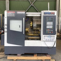 Tour CNC horizontal robuste TCK46 à banc incliné avec capacités de fraisage, perçage et tournage de haute qualité