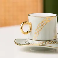 QYD Design raffinato set di tazze da tè in ceramica con manico in oro di lusso con piattini tazze e piattini in porcellana di caffè arabo bordo dorato