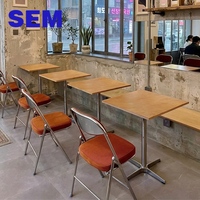 Tavoli in compensato marino e sedie pieghevoli per ristoranti in stile Hong Kong SEM, ideali per negozi di tè, caffè, snack bar e allestimenti catering