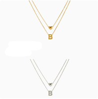 Collar de Acero Inoxidable con Letra X de Alta Calidad para Hombre y Mujer, Estilo Étnico, Collar para Parejas, Accesorios Transfronterizos