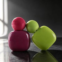 Flacon de parfum de luxe en verre forme galet 30ml 50ml 100ml avec capuchon sphérique couleur personnalisée vide rechargeable vaporisateur de voyage