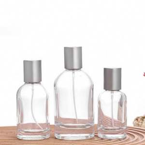 Custom Round Empty Clear/<b>Amber</b> Fragrance <b>Glass</b> Cosmetic Perfume <b>Bottles</b> 30ml 50ml 100ml with Pump Sprayer and Screen Printing - Product Image 2