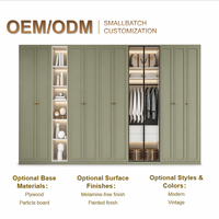 Armoire de rangement avec portes encastrées vert olive style Shaker, poignées en laiton, tiroirs blancs, façade vitrée, certifiée ENF, grande capacité