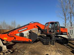 Excavatrice Doosan DX225 d'occasion à vendre – Engin de construction avec composants essentiels : moteur, pompe, PLC - Product Image 2