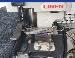 Machine à coudre industrielle OREN à trois lignes pour la finition des bords de tapis, avec moteur, commande informatisée, conception à lit plat haute vitesse RN-2503D - Product Image 3