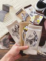 Chaussettes mi-mollet noires et blanches pour filles hiver mode dessin animé imprimé tricoté avec logo antibactérien sur le corps