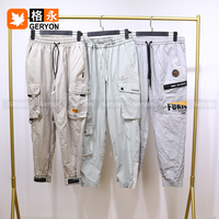 Celana Cargo Panjang Pria Geryon Vintage Thrift Multi-Saku Pakaian Bekas 45kg MOQ Kemasan Bale Grosir