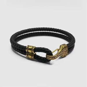Charmes personnalisés en acier inoxydable plaqué <span class=keywords><strong>or</strong></span> <span class=keywords><strong>18</strong></span> <span class=keywords><strong>carats</strong></span> <span class=keywords><strong>Bracelet</strong></span> de créateur en corde avec du cuir pour hommes Vente en gros usine de fabrication de bijoux - Product Image 1