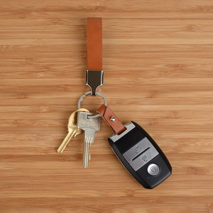 Factory direct supply of <b>leather</b> car <b>keychains</b>, stylish and simple small gift <b>keychains</b>, logo-printable bag charms. - Product Image 2