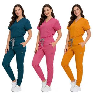 Conjunto de Uniformes Médicos Personalizados con Logotipo, Unisex, Manga Corta, Transpirable, de Spandex, Cómodo para Enfermería y Cirugía - Product Image 1