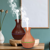 Nouveau Diffuseur d'Arômes Ultrasonique à Grain de Bois, Humidificateur d'Air Silencieux avec Lumière LED Sept Couleurs