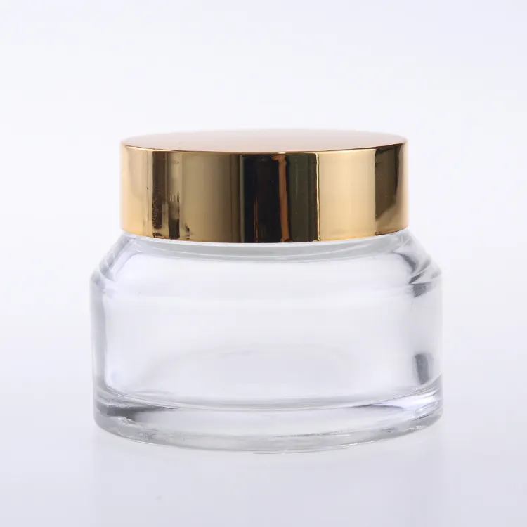 Tinyinhui Hot Sale Wholesales 50g small glass jar clear glass cosmetic jar for skin cream with golden silver black lid