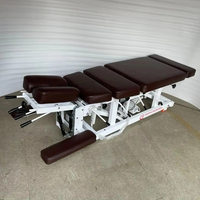Lit de chiropratique électrique et manuel réglable en acier doux pour hôpital, avec table escamotable pour la physiothérapie