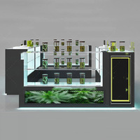 Vitrine à tabac moderne avec éclairage LED, vitrine en verre personnalisable, design de magasin sur mesure, présentoir pour boutique de tabac