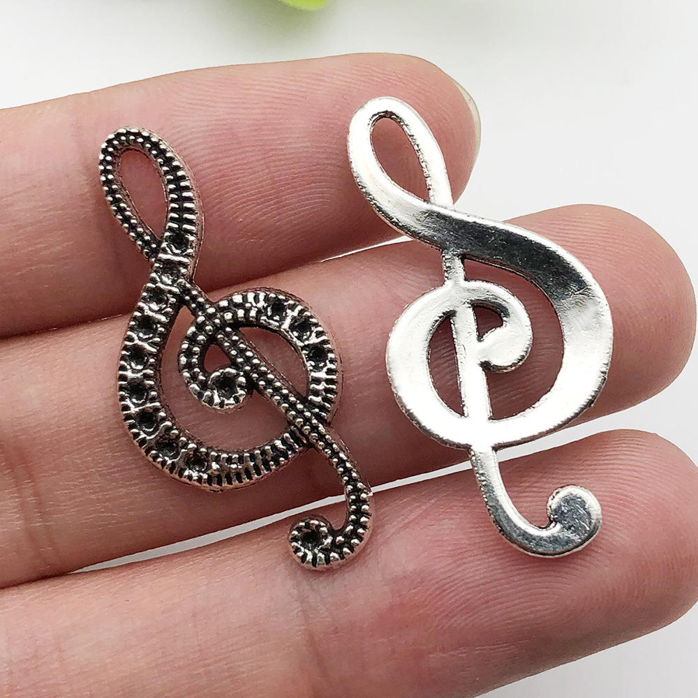 1 music note 15x33mm-2g-7410