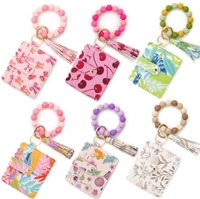 Nouveau porte-clés bracelet en perles PU avec étui à cartes imprimé – Pochette papillon pour femme pour la Saint-Valentin et le Nouvel An