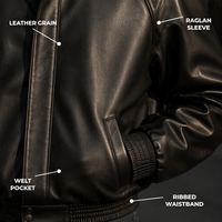 Blouson Bomber Homme en Cuir Grainé Noir Personnalisé à Manches Raglan, Poches Plissées et Boutons Pression, Coupe Boxy pour un Style Urbain Moderne