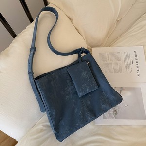 กระเป๋าสะพายข้างสีขาว ความจุเยอะ ตัวล็อคแม่เหล็ก ช่องซิป ใส่ได้ทุกวัน กระเป๋าโท้ทผู้หญิง ฤดูใบไม้ผลิ 2025 - Product Image 3