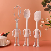 Ustensiles de cuisine : Brosse en silicone créative en forme de poupée humanoïde, fouet à œufs, tasse à mesurer, cuillère plate, spatule, brosse