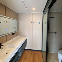 Conteneur préfabriqué en acier Hôtel Péniche Capsule Maison sur l'eau Maison modulaire flottante Petite Maison Logement mobile