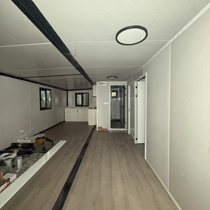 Maison conteneur extensible Sunfine à 2 chambres, design moderne, caractéristique respirante, construction préfabriquée, salon avec patio - Product Image 4