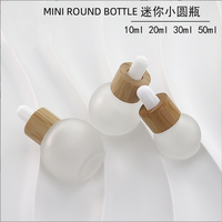 Mini forme de boule de verre ronde 10ml 20ml 30ml 50ml Volume pour huile essentielle Essence liquide crème pour le visage flacon compte-gouttes givré