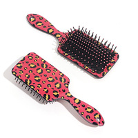 Brosse à cheveux populaire à double face imprimé léopard, peigne coussin d'air à dents denses, brosse démêlante massante pour le cuir chevelu