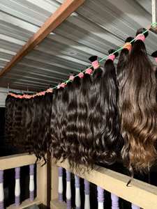 Extensions de cheveux naturels 5x5 en dentelle suisse, texture ondulée noire, pour la création de perruques et le coiffage féminin - Product Image 1