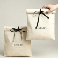 Pochette en toile personnalisée avec logo, ruban et nœud, sac anti-poussière de luxe en coton pour emballage de pyjamas (vente en gros)