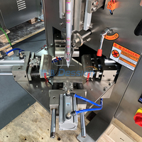 Machine automatique de remplissage et de scellage de sachets de lait sans gras en forme de triangle